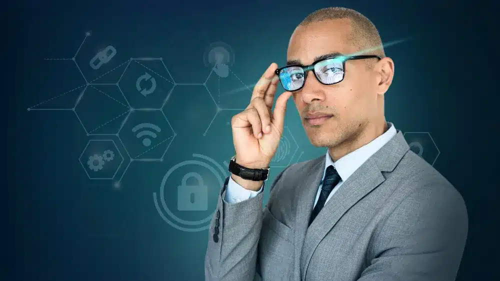 Gerente de Segurança Cibernética: A Defesa Digital das Empresas. Profissional de segurança cibernética analisando ameaças digitais em um ambiente tecnológico.
