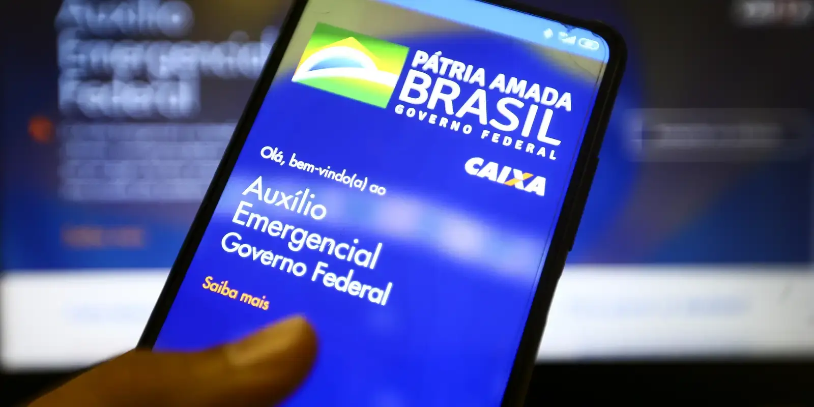 Tela inicial do app Auxílio Emergencial do Governo Federal. plicativo do Auxílio Emergencial exibindo a tela de entrada com logotipo do Governo Federal.