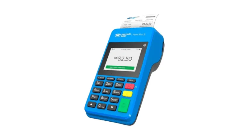 Mercado Pago Point Pro 2 Maquininha Mercado Pago Point Pro 2 com tela exibindo valor de pagamento e comprovante sendo impresso.