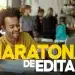 Candidato sorridente estudando em notebook durante maratona de editais de concursos públicos em ambiente de café