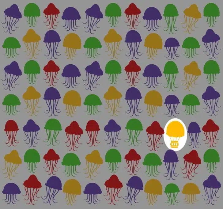 Encontre o balão de ar quente no padrão colorido de águas-vivas Desafio visual com padrão de ilustrações coloridas de águas-vivas em vermelho, verde, amarelo e roxo.