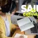 Estudante analisando material de estudo após publicação do edital do concurso da Câmara Municipal.
