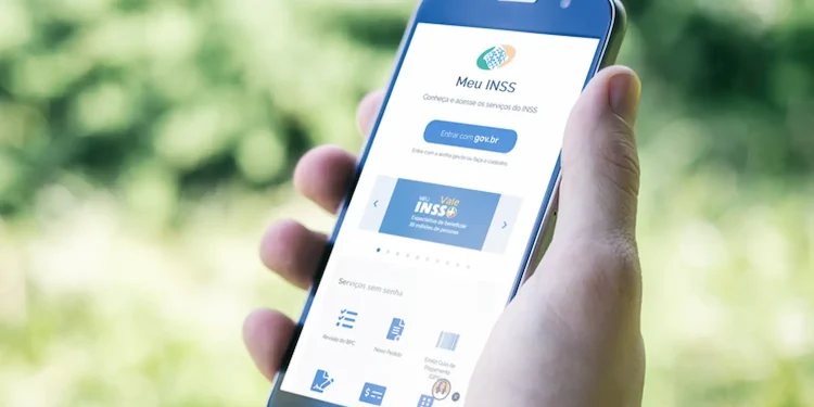 Tela de smartphone exibindo a interface do aplicativo Meu INSS, com informações e serviços relacionados à previdência social.