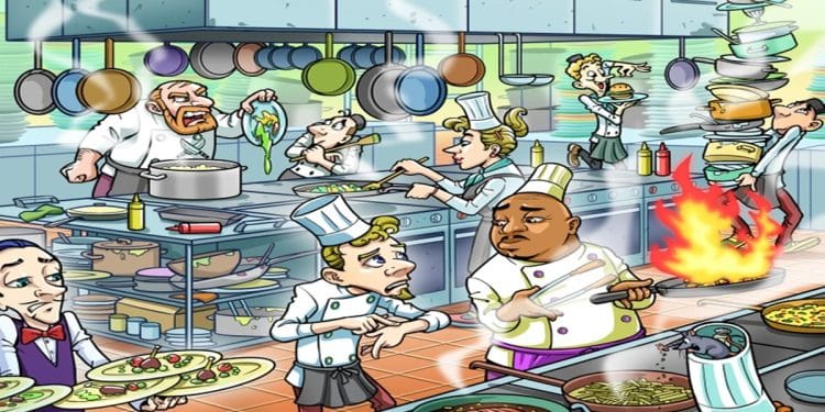 Desafio visual com uma cena de cozinha profissional com vários chefs, panelas, fogo e bagunça enquanto preparam pratos.
