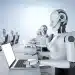 Robôs trabalhando em um escritório com laptops, representando a automação e a inteligência artificial substituindo várias profissões até 2030.
