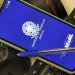 Celular com a tela inicial do aplicativo Carteira de Trabalho Digital do Governo Federal apoiado sobre teclado — veja como emitir o documento pelo app em 2026