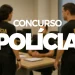 Agentes da Polícia Federal em ambiente de trabalho interno.