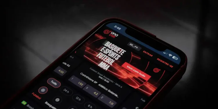 Tela de smartphone exibindo aplicativo de apostas esportivas com odds de futebol, basquete, e-sports e MMA