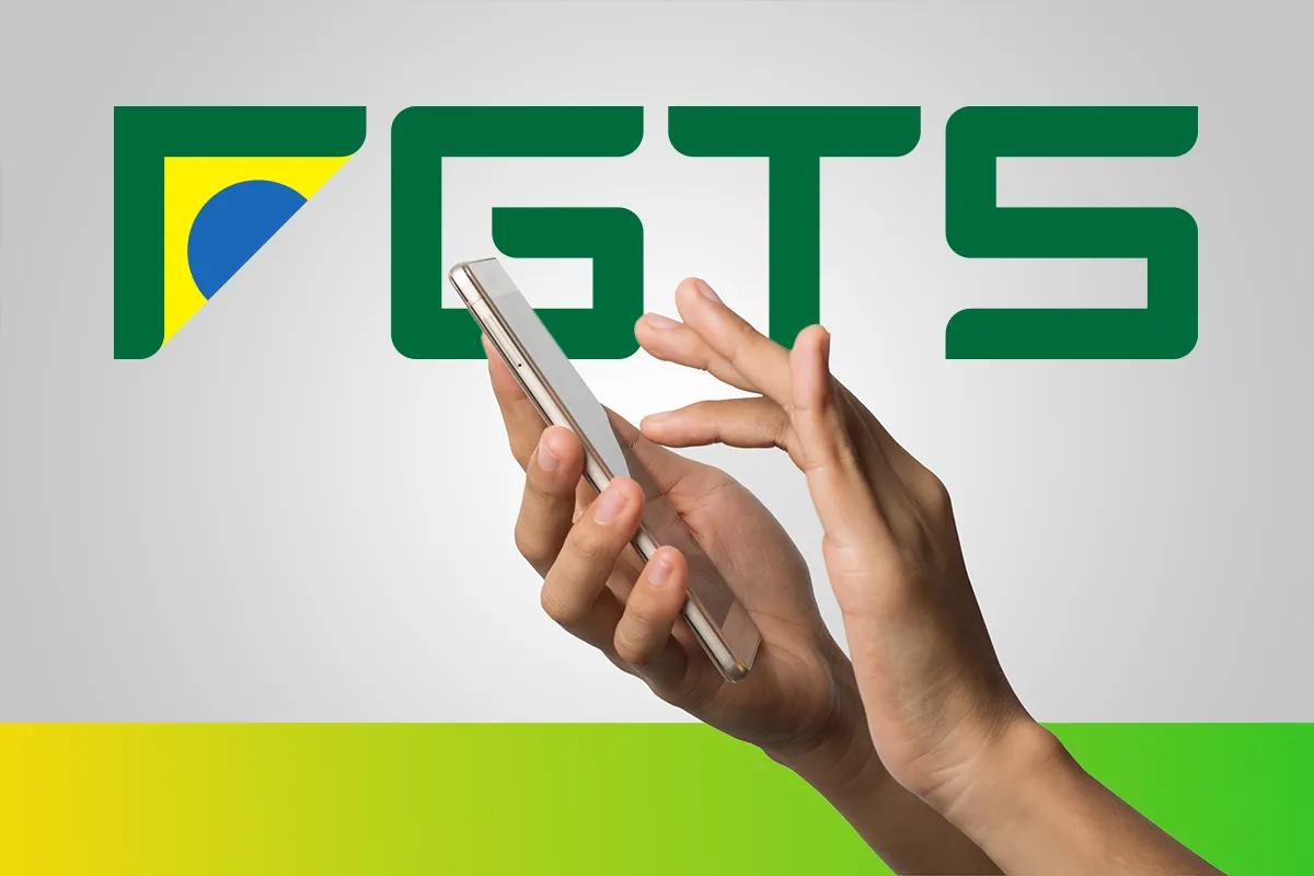 Mãos segurando celular branco em frente a logo do FGTS.