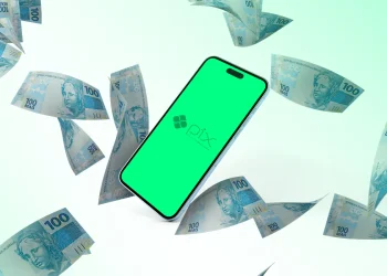 Celular com símbolo do Pix cercado por notas de dinheiro, simbolizando o pagamento de R$ 200 do Pé-de-Meia.