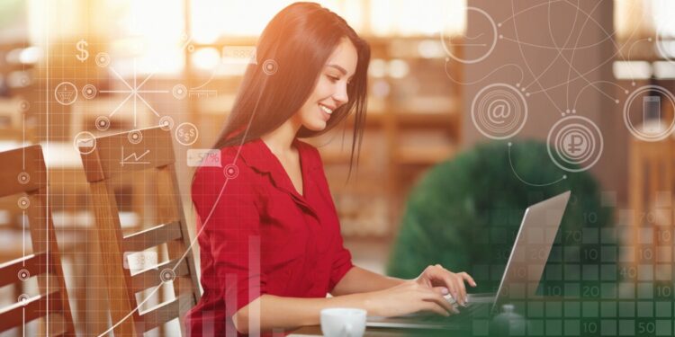 Imagem ilustrativa de mulher de blusa vermelha usando notebook com elementos gráficos digitais ao redor, em referência à etapa de inscrição no curso do Senac RJ.