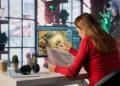 Arquiteta desenvolve projeto digital e físico em escritório moderno.