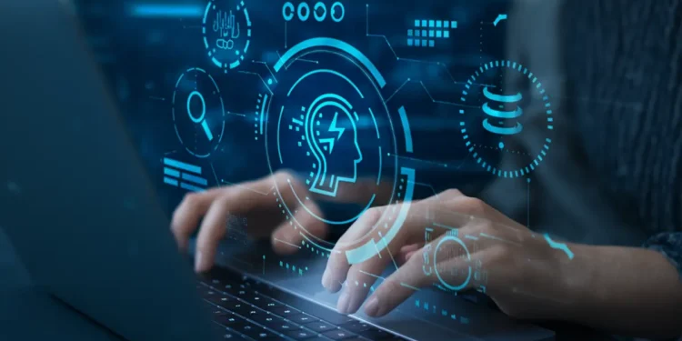 Mãos digitam em um notebook com elementos gráficos que representam a inteligência artificial.