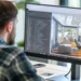 Designer cria projeto de interiores em software de modelagem 3D.